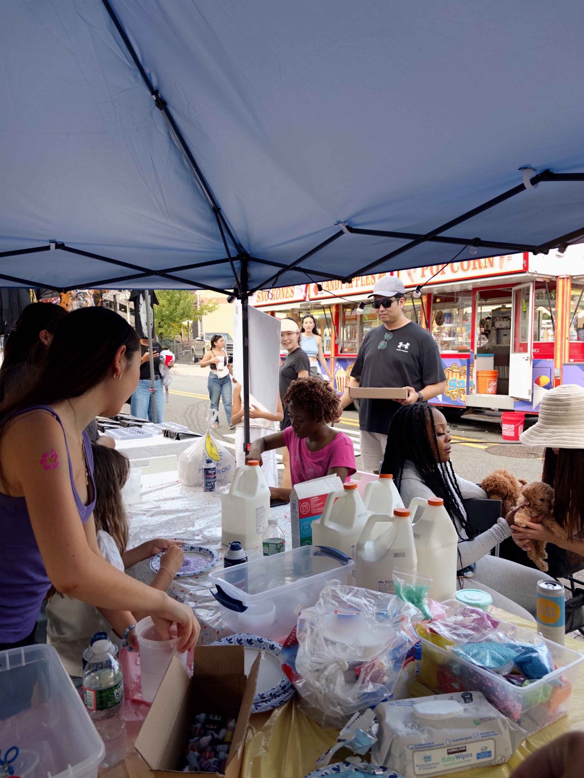 Drawing the Line volunteers running a community outreach booth